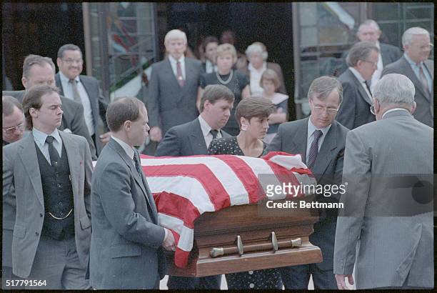 Levittown, Pa.: Members carry the flag-drapped coffin of State Rep. James Wright Jr. From the church following funeral services. Wright, who served...