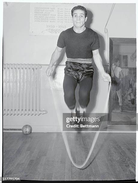 Bantamweight Robert Cohen, a tough, stocky, Algerian born fighter, skips rope during his daily workout at a Paris gym. Although the U.S. Boxing...