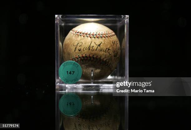 Baseball autographed by Babe Ruth is seen at a Sotheby's preview of a baseball memorabilia sale titled "The Babe Comes Home" November 23, 2004 in New...