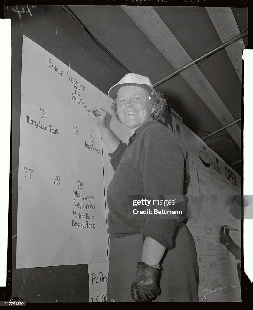 Patty Berg Writing on Blackboard