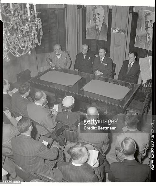 New York: Wallace Campaigners Meet The Press Under Chandeliers. At the newly-opened headquarters of the Wallace-For-President Movement located in a...