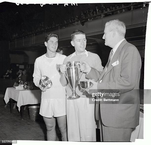 Playing in New York's Seventh Regiment Armory this afternoon, top-seeded Billy Talbert, of New York, defeated Sidney Schwartz for the National Men's...