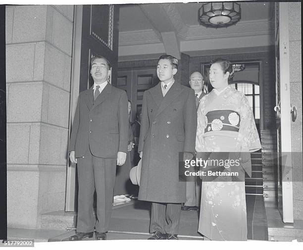 Tokyo, Japan: One of the rare photographs of Japanese Crown Prince Akihito with his parents, Emperor Hirohito and Empress Nagako. The 19-year-old...