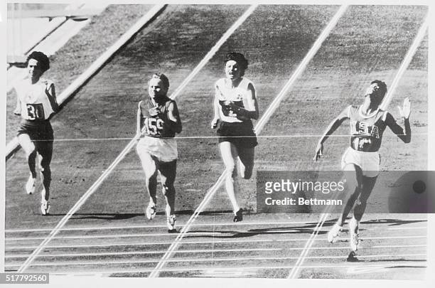 America's Wilma Rudolph , of Clarksville, Tennessee, wins the Women's 100 meter quarter final heat here, September 1st. Others, left to right, are:...