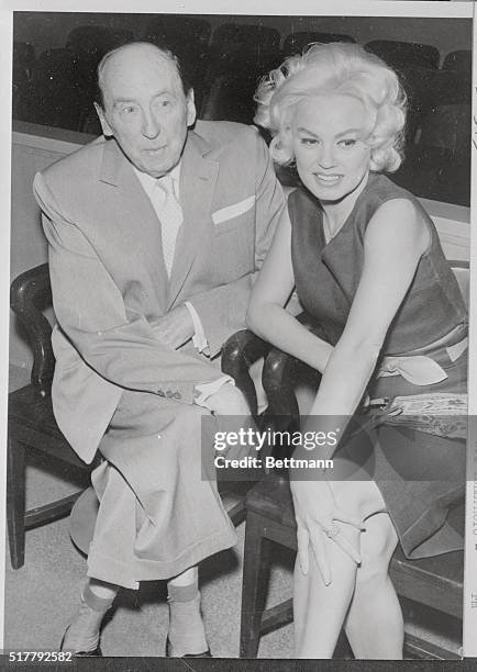 Actress Mamie Van Doren sits in Santa Monica Superior Court this morning with Attorney Jerry Giesler after being granted a divorce from band leader...