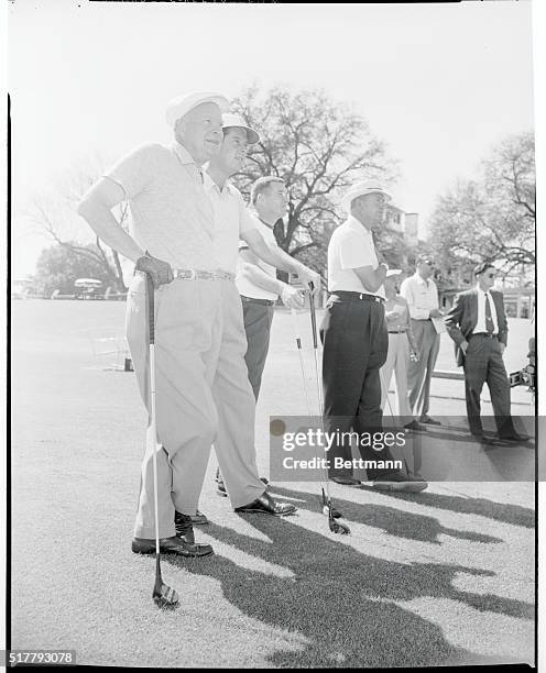Prexy Plays in Fast Company. Augusta, Georgia: President Eisenhower played a round of golf today with a trio of big leaguers, and is shown here...