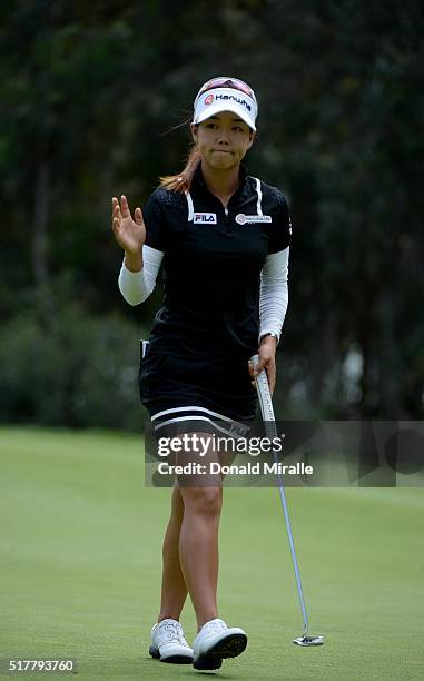 Jenny Shin reacts to her birdie putt on the first hole during the final round of the KIA Classic at the Park Hyatt Aviara Resort on March 27, 2016 in...