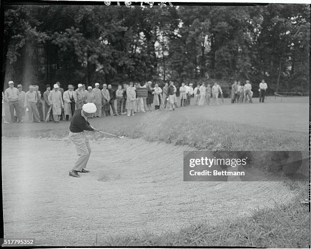 Washington, DC: United States Open Champion Ed Furgol blasts out of a soundtrap at the third hole during the opening round of the Third Annual Canada...