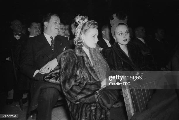 American restauranteur Toots Shor , his wife, and American former actress Dorothy DiMaggio , the wife of American professional baseball player Joe...