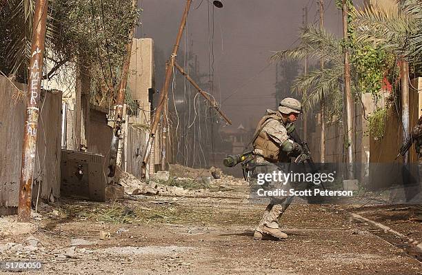 Stepping back into the battlefield, U.S. Marines of the Light Armored Reconnaissance company of 1st Battalion 3rd Marines, clear houses at the site...