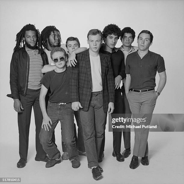 British reggae and pop group UB40, 1983. Left to right: trumpeter Astro , bassist Earl Falconer, saxophonist Brian Travers, trombonist Norman Hassan,...