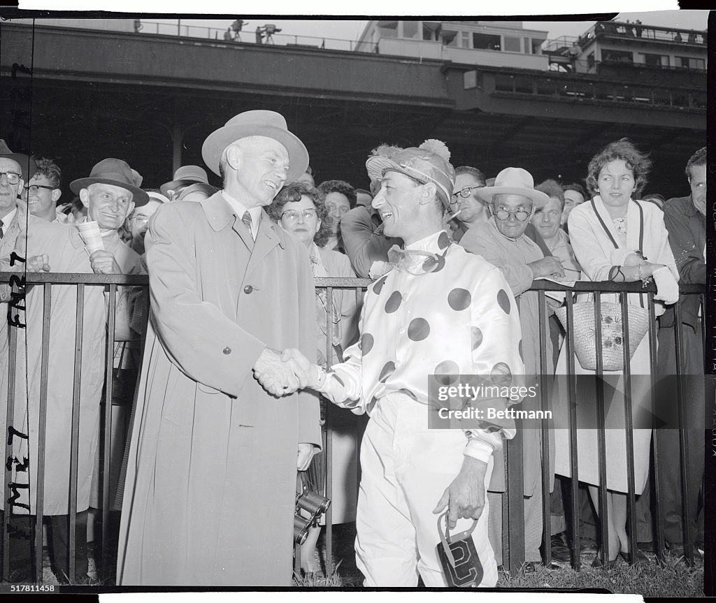 Eddie Arcaro Shaking Earl Sand's Hand