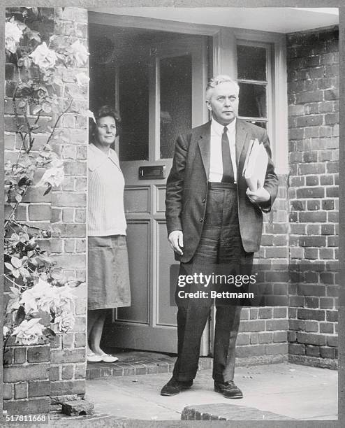 His wife sees him off as British Labor Party leader Harold Wilson leaves his London home for work early June 17th. Wilson was bound for the House of...