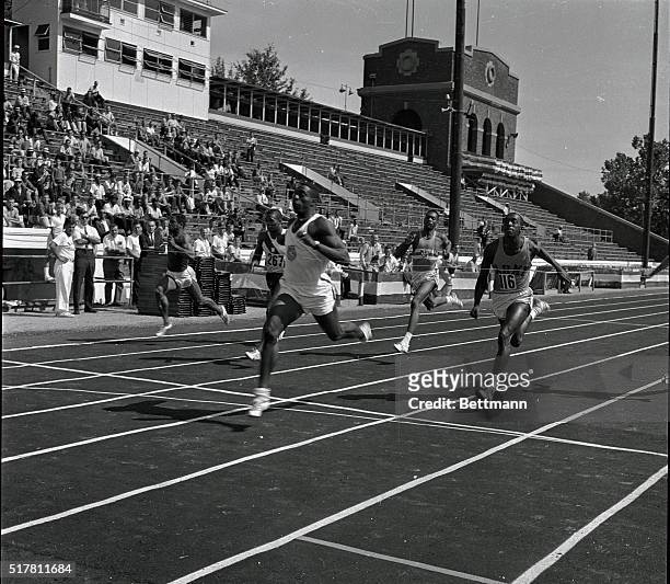 Two sprinters Bob Hayes, Florida A&M and Larry Questad, shown in photo, Pacific AAU, matched times of 0:9.3 in trial heats of the 100 yard dash in...