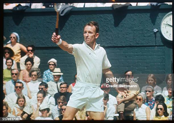 Wimbledon, England:Australian left hander Rod Laver battling it out against John Newcombe on the famous center court in the Men's Singles Tennis...