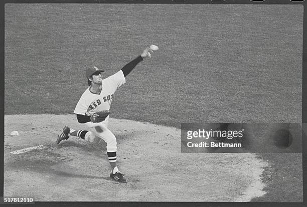 Bill Lee starting pitcher for the Boston Red Sox in the 7th and final game of the World Series at Fenway Park, pitches his first offering to...