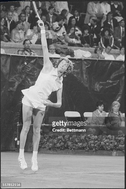 Forest Hills, New York: Martina Navratilova and Margaret Court , display their serves as they battle each other in the U. S. Open Tennis...