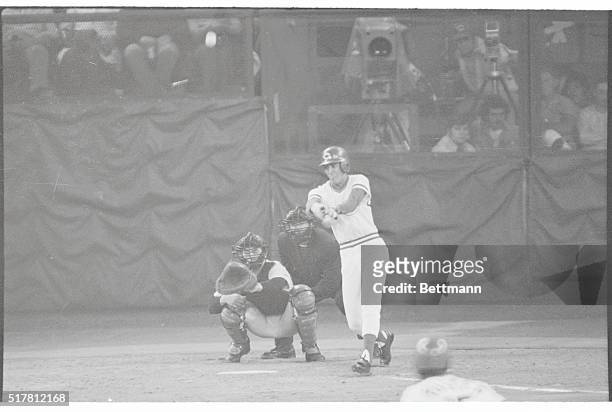 Cincinnati: Dave Concepcion hits a run-scoring double off Luis Triant in the fourth inning of fourth game of World Series. Red Sox catcher is Carlton...