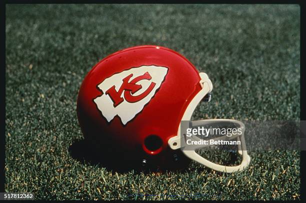 Kansas City Chiefs logo on a helmet.