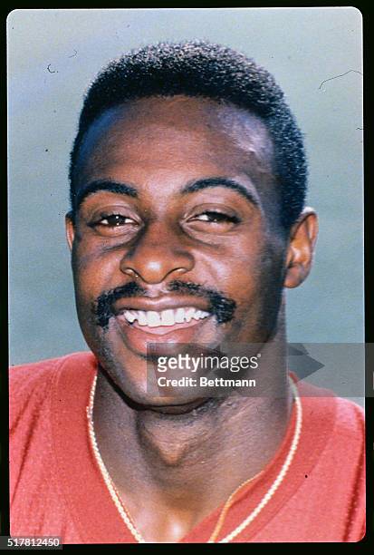San Francisco, CA: Close-up of Jerry Rice, wide receiver for the San Francisco 49ers, smiling and wearing uniform.