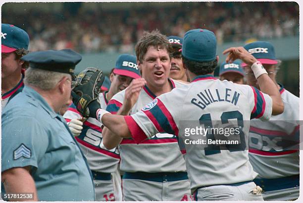 New York: Chisox Tom Seaver is mobbed by teammates after winning his 300th game, beating the Yanks, 4-1. That's Ozzie Guillen with outstretched arms.