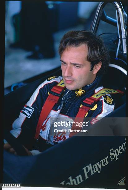 Closeup of auto racer Elio DeAngelis in automobile. Photog: David Olson. Lson