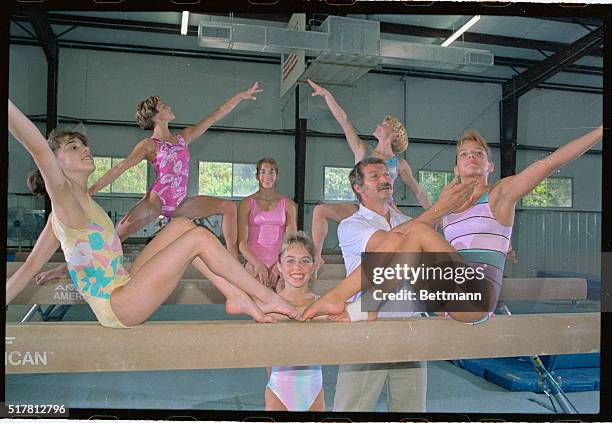 Houston's Bela Karoyli will pit his girls against the rest of the Nation at U.S. Gymnastics Championships in Houston, 7/7-10. Working out 6/21, are...