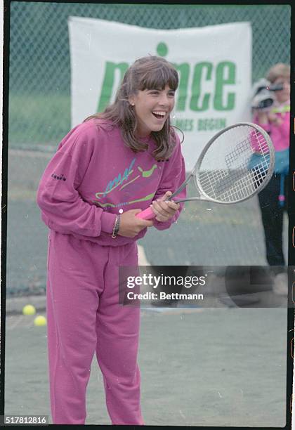 New York: Jennifer Capriati, the 14-year-old tennis phenom, flashes her infectious smile as she displays her talents during an appearance at the...