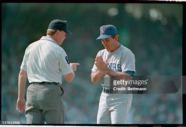 Chicago: Rangers' manager Bobby Valentine pleads his case with first base umpire Jim Joyce during the 4th inning. Umpire Joyce tells the manager that...
