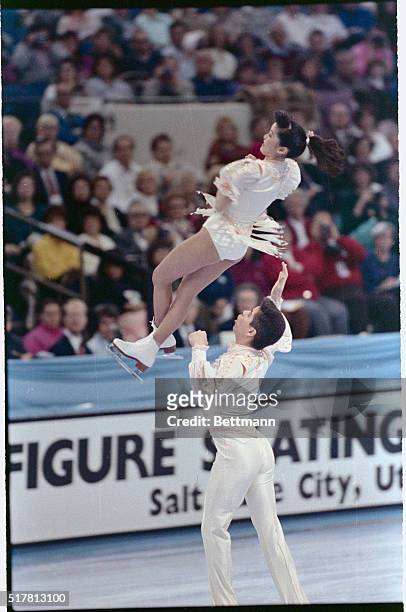 Salt Lake City: Kristy Yamaguchi spins through the air as she is tossed by her partner Rudi Galindo while skating to a gold metal in pairs...