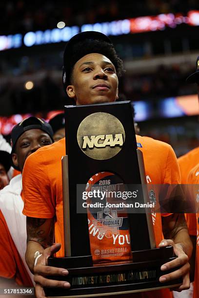 Malachi Richardson of the Syracuse Orange holds the trophy as he celebrates their 68 to 62 win over the Virginia Cavaliers during the 2016 NCAA Men's...