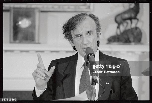 Various closeups of Elie Wiesel appealing to President Reagan to cancel his proposed trip to Bitburg military cemetery in W. Germany where the German...