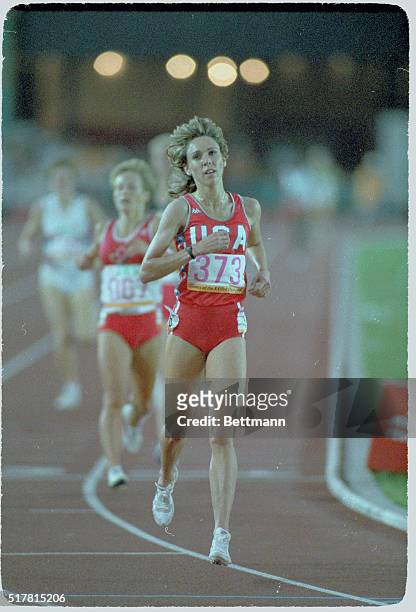 S Mary Decker leads the pack in the first heat of the 3000m run at the Olympics in Los Angels 8/8. She won the heat over Italy?s Agnese Poaamai and...