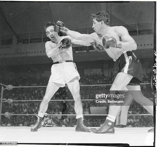 Hard Knock on Road to Title. Syracuse, New York: It was no primrose path Carmen Basilio traveled last night to the welterweight championship. He took...