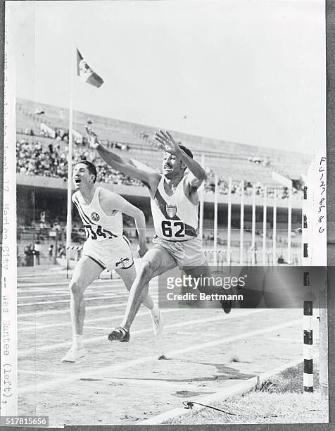 Same Times but No Dead Heats. Mexico City, Mexico: At left above Wes Santee of the U.S., and Juan Miranda of Argentina are shown hitting the finish...