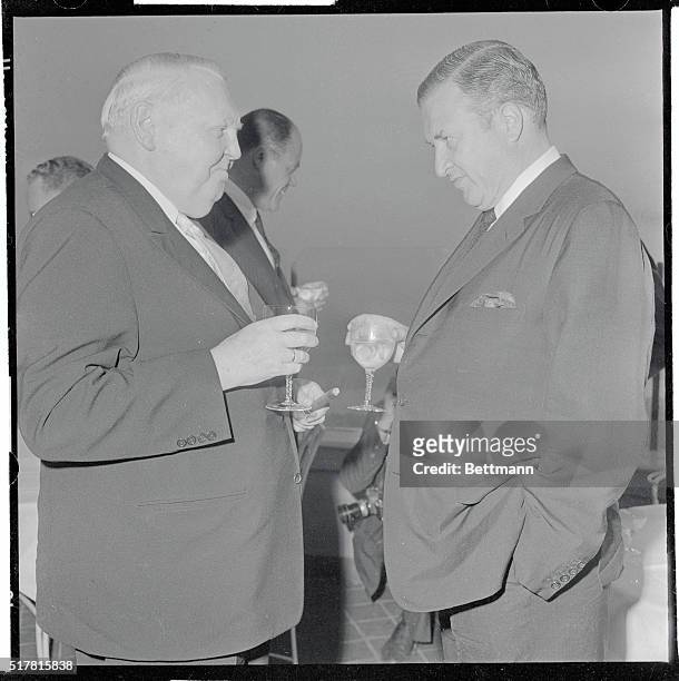 King" and a "Crown Prince"...Bonn, West Germany: Henry Ford II , the American "Auto King," enjoys a chat with West German Economics Minister Ludwig...