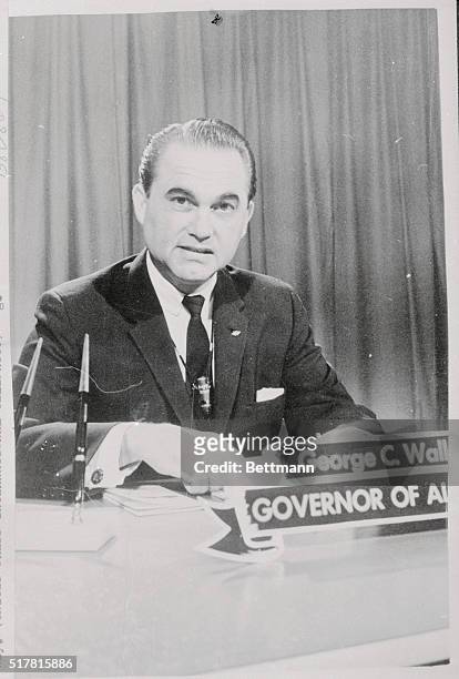 Governor George Wallace appeared on statewide television 6/9 to appeal to Alabamians to remain at home Tuesday when he plans to block the admission...