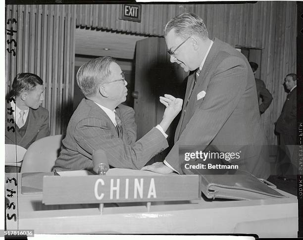 Chinese Ambassador Tingfu F. Tsiang, , is shown conferring with Paul Martin, Canada's delegate to the United Nations, shortly before the General...