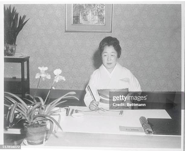 Japan's Empress Nagako. Tokyo, Japan: Japanese empress Nagako, who celebrates her 60th birthday on March 6th, is shown painting, one of her favorite...