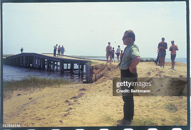 Edgartown, Mass.: Famed Boston criminal lawyer F. Lee Bailey views the scene at Dyke Bridge, Chappaquiddick Island where Mary Jo Kopechne drowned in...