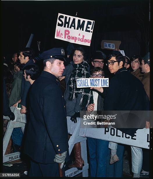 New York: Demonstrators outside the Waldorf-Astoria protest visit of French President Georges Pompidou March 2nd. Pro-Israel groups were protesting...