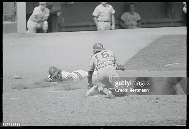 Milwaukee - Milwaukee Brewers third baseman Kurt Bevacqua touches home plate before the tag of Chicago White Sox catcher Brian Downing as he scored...