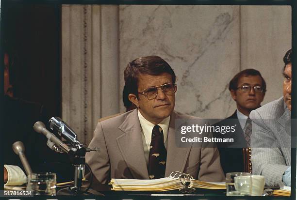 Senator Robert Morgan listening during Senate Intelligence Committee session on CIA and deadly toxin stocks.