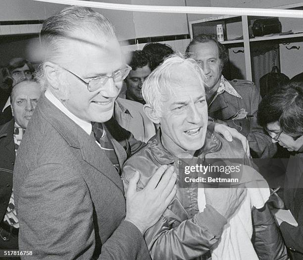 Boston: Baseball Commissioner Bowie Kuhn congratulates Sparky Anderson as the Reds won the 1975 World Series.