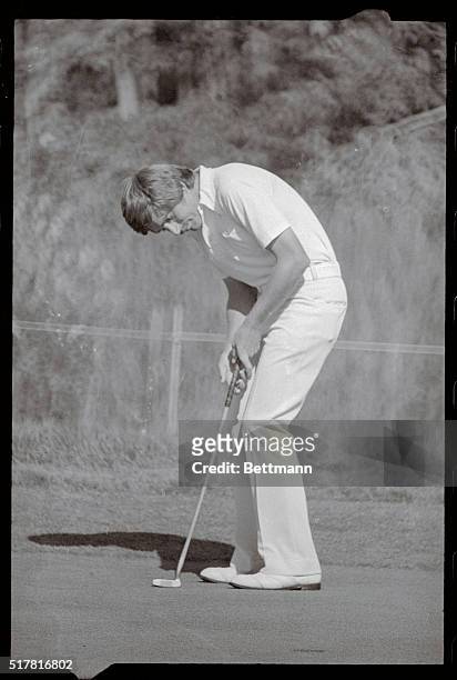 Wethersfield, Connecticut: Rik Messengale of San Antonio, Texas, gives that little extra push as a bird drops for him on the 5th hole giving him four...