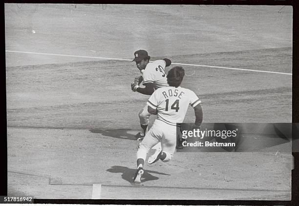Reds' Pete Rose upsets Yankee second baseman Willie Randolph to break up double play in the sixth inning 10/16.