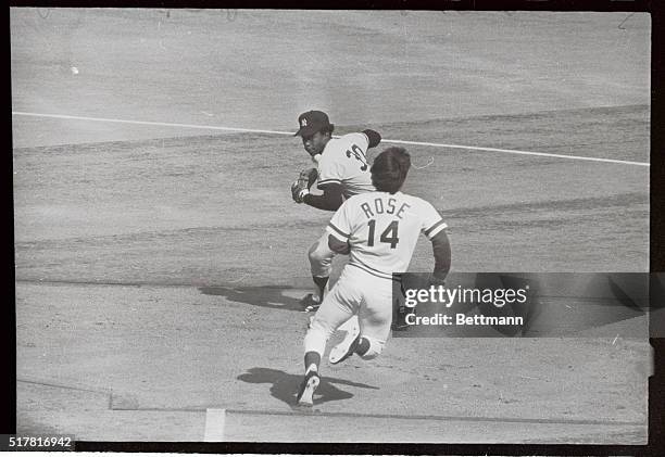 Reds' Pete Rose upsets Yankee second baseman Willie Randolph to break up double play in the sixth inning 10/16.