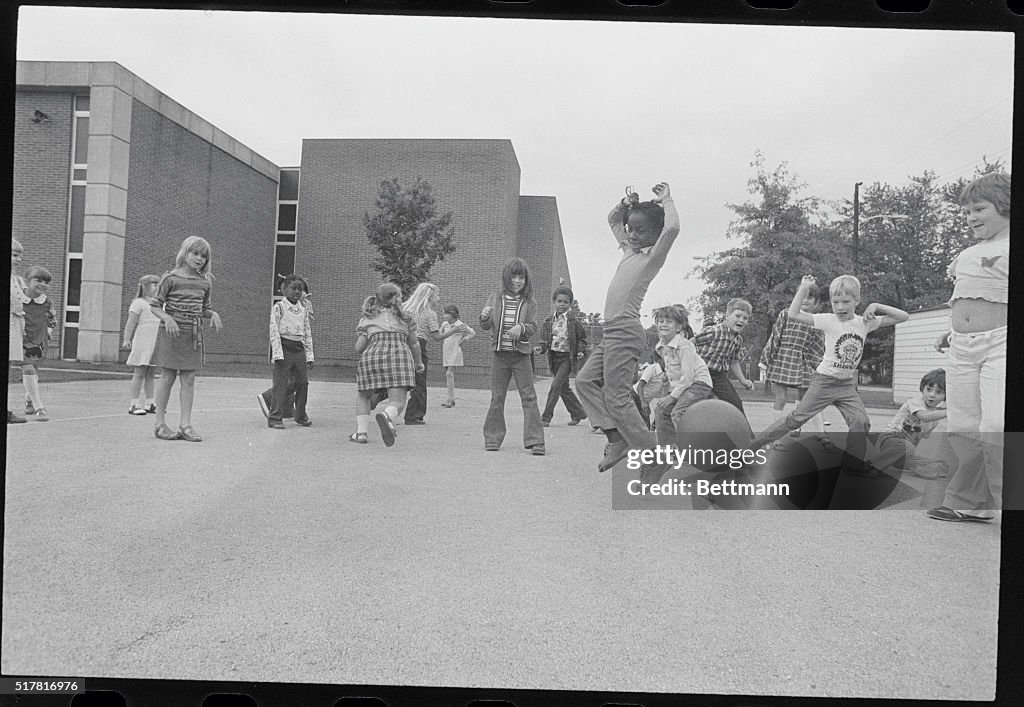 Youngsters During Recess in the School Park