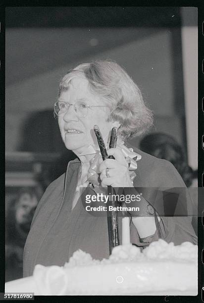 Holding her walking stick, anthropologist Margaret Mead celebrates her 75th birthday on December 16, at a party at the American Museum of Natural...