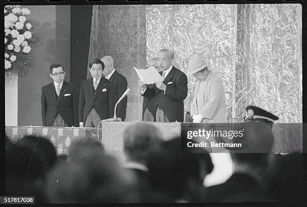 Tokyo, Japan: Emperor Hirohito, accompanied by Empress Nagako, speaks in a celebration marking the 50th anniversary of the emperor's accession to the...